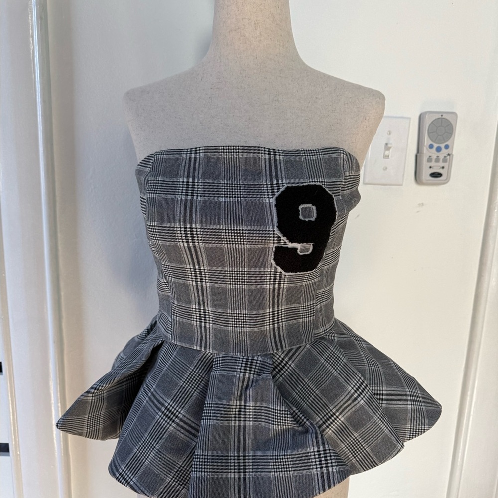 Anthropologie Mare Mare Strapless Varsity
Peplum Top Number 9 in b&w plaid